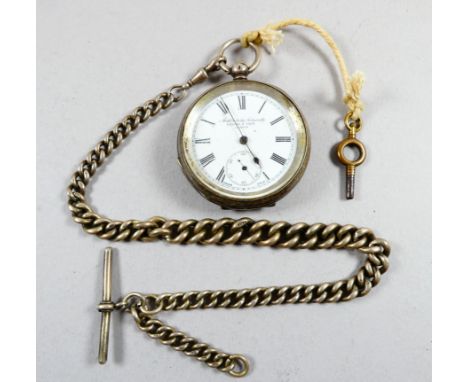 A silver cased open face pocket watch - by Kendall &amp; Dent, London, the white enamel dial set out in Roman numerals with a