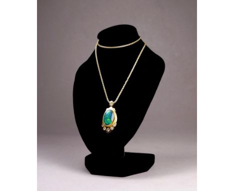 An 18ct yellow gold black opal pendant - set with nine diamonds on an 18ct fancy link chain, total weight 10.3g. 