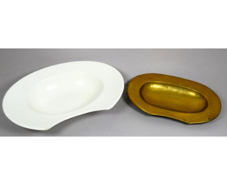 A 19th century brass blood letting bowl - width 28cm, together with a white ceramic barber's bowl, width 34cm. 