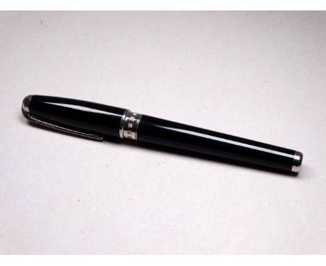 A Dupont ballpoint - black with a diamond set band, in an associated box.