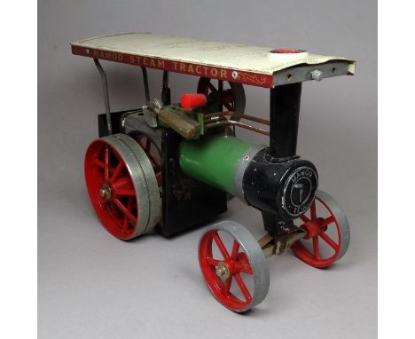 A Mamod steam tractor - width 26cm, with dilapidated original box. 
