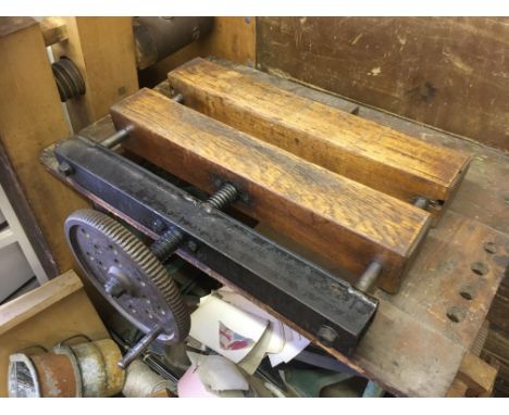 Bookbinding equipment and accessories. Including a large laying press and pair of sewing frames etc., laying press with appro