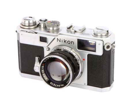 1958, chrome, serial no. 6311828, with Nikon Nikkor-S.C. f/1.4 50mm lens, black, serial no. 347618, body, G, shutter working,