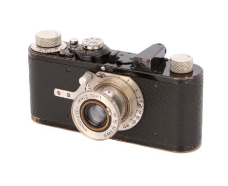 1929, black, serial no. 18555, with Leitz Elmar f/3.5 50mm lens, nickel, body, G-VG, shutter working, focus knob replaced, le