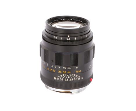 1971, black, serial no. 2489382, body, E, elements, E, with lens hood and caps, in maker's boxNote: Lot imported under Tempor