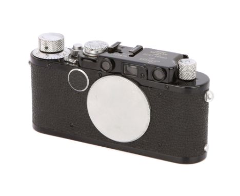 1932, upgraded from II, black, serial no. 96126, body, VG-E, shutter workingNote: Lot imported under Temporary Admission. 5% 