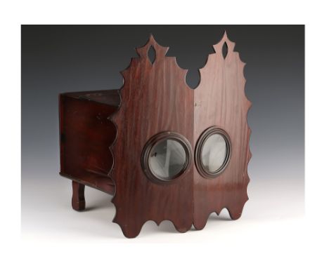European possibly Spanish, mid 19th century, unsigned, constructed of stained French polished wood, with fret work front with
