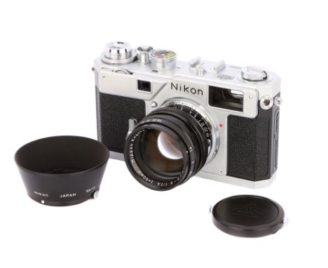 2000, chrome, serial no. 205948, with Nikon Nikkor-S f/1.4 50mm lens, black, serial no. 2055126, body, E, shutter working, le