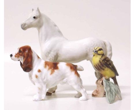 Royal Doulton Spaniel, Beswick Welsh pony and a Goebel bird. Condition report: see terms and conditions