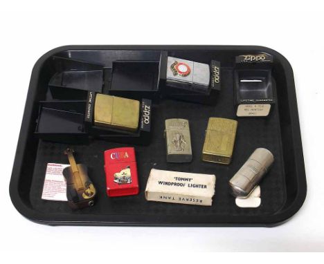 3 Zippo lighter (1 Man United), Tommy lighter and three others Condition report: see terms and conditions