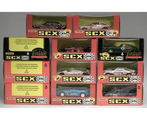 Eleven Matchbox SCX boxed model cars, to include: Jaguar E Vintage Ref.83710, BMW M3 Ref.83700, Seat 850 Ref.83880, two Subar