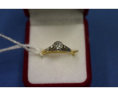 An 18ct gold solitaire diamond ring,&nbsp;approximately .5ct. 