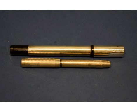 A Whytwarth silver engine turned retractable fountain pen;&nbsp;together with another similar example. 