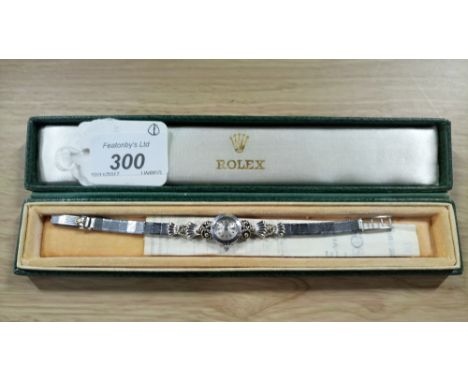ROLEX , 18 CT WHITE GOLD , LADIES VINTAGE WATCH 1958 WITH ORIGINAL 18 CT WHITE GOLD ORNATE STRAP, BOX , SALES RECEIPT JANUARY