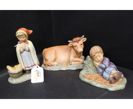 Three Hummel Nativity figures, sleeping shepherd, peasant girl and ox 