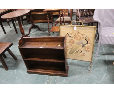 Small 20th century oak bookcase with beaded edge and brass framed fire screen with central peacock embroidery 