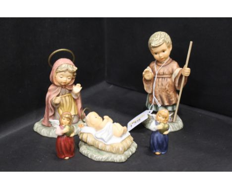 Five Hummel Nativity figures, Mary, Joseph, Jesus and two angels 