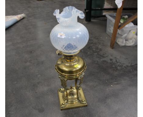 Victorian brass oil lamp with milk glass shade