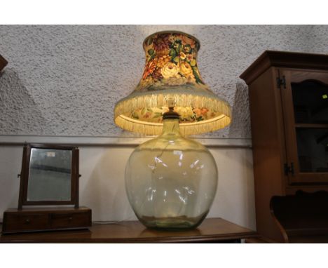 Large lamp with clear glass base and vintage tasselled shade, height 92 cm