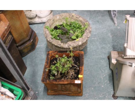 Square terracotta planter and composite stone planter on stand 