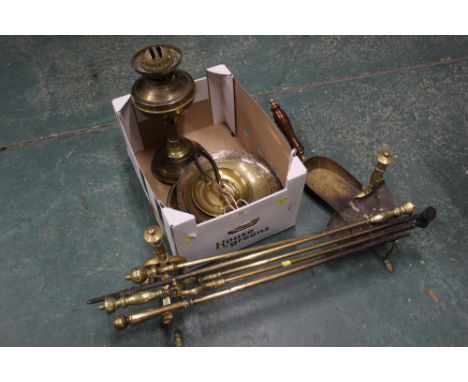 Box of brassware, fire irons, oil lamp etc