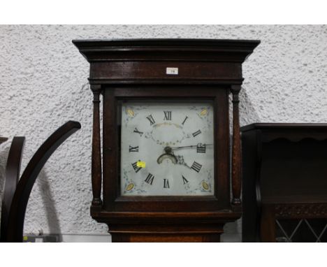 Oak cased 30 hour longcase clock with painted dial, pendulum and weight