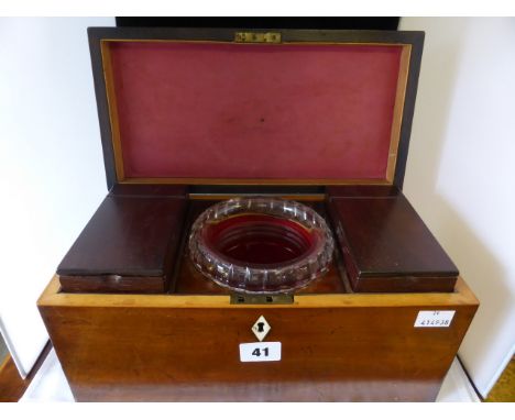 A late George III mahogany tea caddy, rectangular lid opens to reveal removable cut glass mixing bowl, flanked by a pair of r