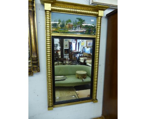 A giltwood and verre eglomise pier mirror, early 19th century, shallow stepped breakfront pediment above counter turned top r