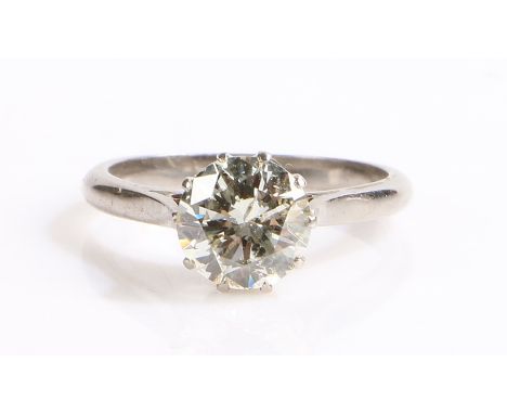 Diamond solitaire ring, the round cut diamond at approximately 1.90 carat with ten claws to the platinum shank, ring size L 