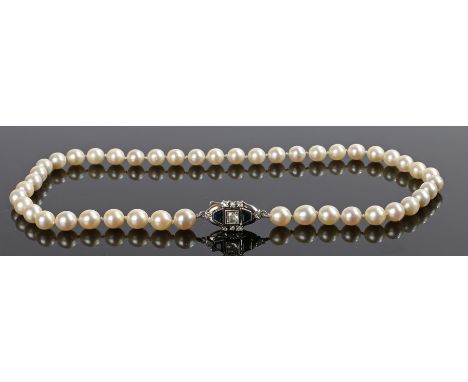 Pearl diamond and sapphire necklace, the clasp set with diamonds and sapphire to the string of pearls, 43cm long