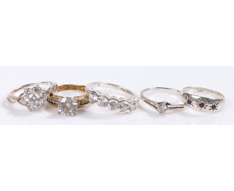 Five silver and coloured paste set rings, various sizes and styles, to include a silver gilt example, 14.6g (5)Some rubbing t