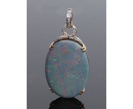 Lorique 18 carat gold opal and diamond set pendant, the oval opal caped with a diamond band and loop, 38mm high