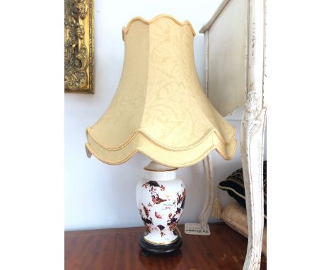 A porcelain table lamp with shade 