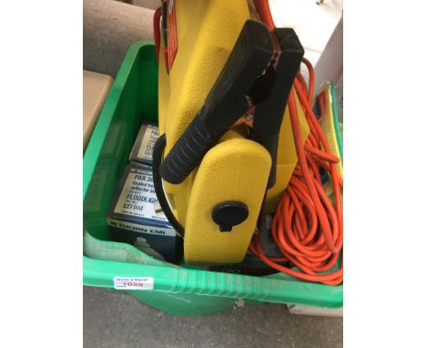 A box containing a battery jump lead, few flood light bulbs, etc 