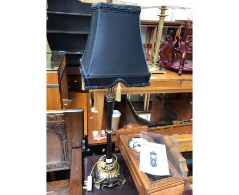 A tall reproduction table lamp 