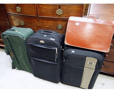 A vintage brown leather briefcase &amp; three modern trolley suitcases Condition Report: please request*  *Condition is not s