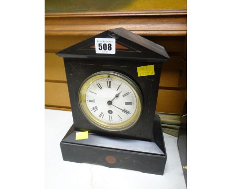 An antique slate mantel clock Condition Report: please request*  *Condition is not stated in this type of auction with descri