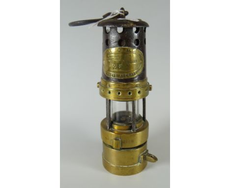 An early E Thomas &amp; Williams Ltd, Aberdare cambrian midget miner's lamp Condition Report: please request*  *Condition is 