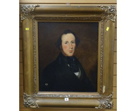 A nineteenth century oil on canvas head &amp; shoulders portrait of a gentleman in a similar period antique gilt frame, 82 x 