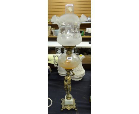 An antique brass &amp; marble based figural oil lamp with etched clear glass reservoir, conforming with the etched glass shad