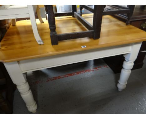 A vintage pine top farmhouse table with painted base Condition Report: please request*  *Condition is not stated in this type