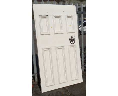 A large painted white pitch pine three-panelled front door together with a cast iron knocker (outside) Condition Report: plea