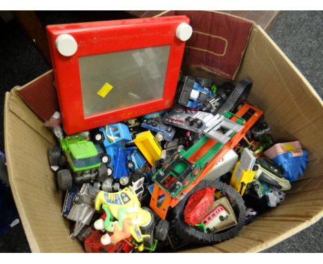 Box of vintage children's toys including Etch-A-Sketch, model cars &amp; soldiers ETC Condition Report: please request*  *Con