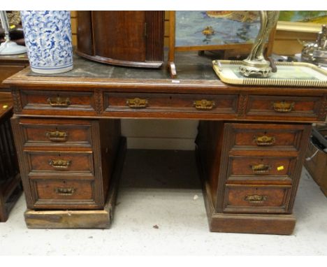 A vintage desk of nine drawers with leather top (for restoration) Condition Report: please request* *Condition is not stated 