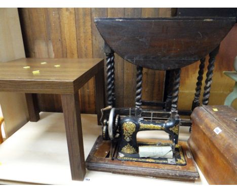 A vintage Jones cased sewing machine &amp; a barley twist gate leg table ETC Condition Report: please request*  *Condition is