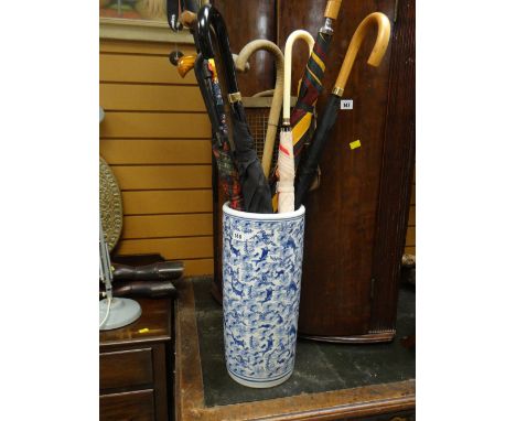 A blue &amp; white pottery stick stand &amp; contents Condition Report: please request*  *Condition is not stated in this typ