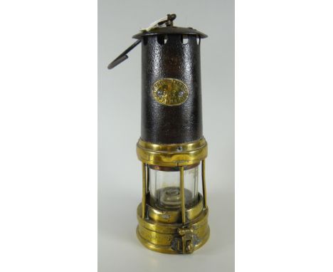 An early miner's lamp for Insoles Ltd of Cymmer, no 943 Condition Report: please request*  *Condition is not stated in this t