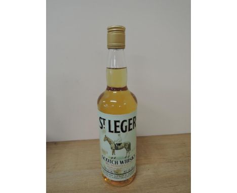 A bottle of St Leger Leger Light Scotch Whisky, label states 40fl oz 40% vol, bottle stamped 70cl to base, appears reproducti