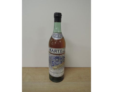 A bottle of 1948 J &amp; F Martell Very Old Pale Cognac, Three Star, Imported and Distributed under the Authority of His Maje