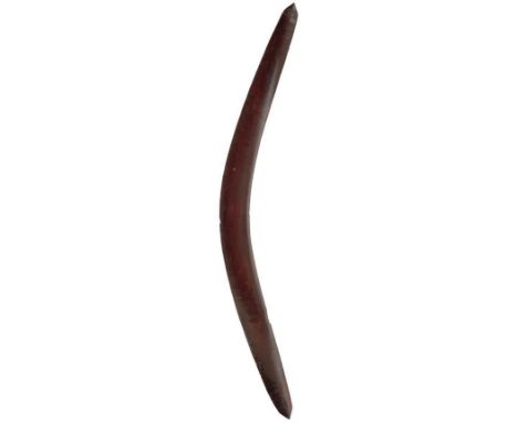 A BRACE OF 19TH CENTURY STONE CARVED ABORIGINAL BOOMERANGS,  the first 80cm diameter and with stone cut drag band on the uppe